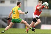 16 March 2019; Ruairi Deane of Cork in action against Leo McLoone of Donegal during the Allianz Football League Division 2 Round 6 match between Cork and Donegal at Páirc Uí Rinn in Cork. Photo by Eóin Noonan/Sportsfile