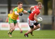 16 March 2019; Ruairi Deane of Cork is tackled by Eoghan Bán Gallagher of Donegal during the Allianz Football League Division 2 Round 6 match between Cork and Donegal at Páirc Uí Rinn in Cork. Photo by Eóin Noonan/Sportsfile