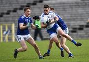 16 March 2019; Shane Carey of Monaghan in action against Ciaran Brady and Niall Murray of Cavan during the Allianz Football League Division 1 Round 6 match between Monaghan and Cavan at St Tiernach's Park in Clones, Monaghan. Photo by Oliver McVeigh/Sportsfile