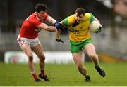 16 March 2019; Jamie Brennan of Donegal is tackled by Conor Dennehy of Cork during the Allianz Football League Division 2 Round 6 match between Cork and Donegal at Páirc Uí Rinn in Cork. Photo by Eóin Noonan/Sportsfile