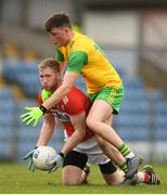16 March 2019; Ruairi Deane of Cork in action against Niall O'Donnell of Donegal during the Allianz Football League Division 2 Round 6 match between Cork and Donegal at Páirc Uí Rinn in Cork. Photo by Eóin Noonan/Sportsfile
