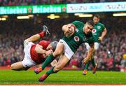 16 March 2019; Jordan Larmour of Ireland scores his side's last minute try despite the tackle of Owen Watkin of Wales during the Guinness Six Nations Rugby Championship match between Wales and Ireland at the Principality Stadium in Cardiff, Wales. Photo by Brendan Moran/Sportsfile