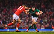 16 March 2019; Jordan Larmour of Ireland is tackled by Owen Watkin of Wales during the Guinness Six Nations Rugby Championship match between Wales and Ireland at the Principality Stadium in Cardiff, Wales. Photo by Ramsey Cardy/Sportsfile