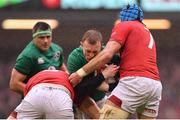 16 March 2019; Keith Earls of Ireland is tackled by Alun Wyn Jones, left, and Justin Tipuric of Wales during the Guinness Six Nations Rugby Championship match between Wales and Ireland at the Principality Stadium in Cardiff, Wales. Photo by Ramsey Cardy/Sportsfile