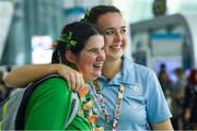 17 March 2019; Team Ireland's Aoife McMahon, left, a member of COPE Foundation, from Clonakilty, Co. Cork, with table tennis athletic services volunteer Sarah Hayes, from Rosscarbery, Cork, celebrate St. Patrick's day on Day Three of the 2019 Special Olympics World Games in the Abu Dhabi National Exhibition Centre, Abu Dhabi, United Arab Emirates. Photo by Ray McManus/Sportsfile