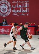 17 March 2019; Team Ireland's Keith Murphy, a member of the Palmerstown Wildcats Special Olympics Club, from Ballybritas, Co. Laois, races clear of Arthur Gondard of France in the SO Ireland v SO France Basketball game on Day Three of the 2019 Special Olympics World Games in the Abu Dhabi National Exhibition Centre, Abu Dhabi, United Arab Emirates. Photo by Ray McManus/Sportsfile