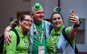17 March 2019; Team Ireland volunteers Michelle Meehan, from Nury, Brendan McNeice, Belfast, and Fiona Kennedy, from Tipperary take a 'selfie' on Day Three of the 2019 Special Olympics World Games in the Abu Dhabi National Exhibition Centre, Abu Dhabi, United Arab Emirates. Photo by Ray McManus/Sportsfile