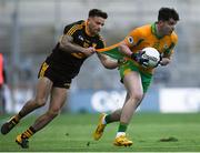 17 March 2019; Colin Brady of Corofin in action against Micheál Burns of Dr. Crokes' during the AIB GAA Football All-Ireland Senior Club Championship Final match between Corofin and Dr Crokes at Croke Park in Dublin. Photo by Harry Murphy/Sportsfile