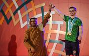 17 March 2019; Team Ireland's Patrick Quinlivan, a member of the Salto SOC from Letterkenny, Co. Donegal, is congratulated after being presented with the 4th of his 7 medals for Artistic Gymnastics from H.H. Abdulla Bin Mohomed Al Hamed on Day Three of the 2019 Special Olympics World Games in the Abu Dhabi National Exhibition Centre, Abu Dhabi, United Arab Emirates. Photo by Ray McManus/Sportsfile