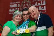 17 March 2019; Team Ireland's Patrick Quinlivan, a member of the Salto SOC from Letterkenny, Co. Donegal, who won seven medals, two Gold and five Silver, for Artistic Gymnastics with his parents Angela McGee and Mick Quinlivan on Day Three of the 2019 Special Olympics World Games in the Abu Dhabi National Exhibition Centre, Abu Dhabi, United Arab Emirates. Photo by Ray McManus/Sportsfile