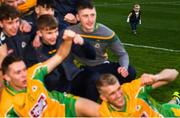 17 March 2019; Liam Comer, aged 1, son of Corofin selector Dave Comer watches the team celebrate following the AIB GAA Football All-Ireland Senior Club Championship Final match between Corofin and Dr Crokes at Croke Park in Dublin. Photo by Harry Murphy/Sportsfile