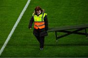 16 March 2019; Croke Park steward Sheelagh Burke carries in the bench after the team photos before the Allianz Football League Division 1 Round 6 match between Dublin and Tyrone at Croke Park in Dublin. Photo by Piaras Ó Mídheach/Sportsfile