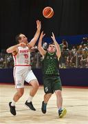 19 March 2019; Team Ireland's Jamie Ennis, a member of the Palmerstown Wildcats Special Olympics Club, from Dublin 22, Co. Dublin, in action against Nicolas Zurbruegg of  SO Switzerland during the Male / Mixed Playoff Round 1 Basketball game on Day Five of the 2019 Special Olympics World Games in the Abu Dhabi National Exhibition Centre, Abu Dhabi, United Arab Emirates. Photo by Ray McManus/Sportsfile