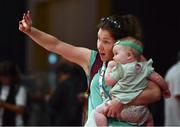 19 March 2019; Team Ireland supporters Fionnuala McLoughlin, from Greystones, Co Wicklow, and nine month old Seren Reed during the Male / Mixed Playoff Round 1 Basketball game on Day Five of the 2019 Special Olympics World Games in the Abu Dhabi National Exhibition Centre, Abu Dhabi, United Arab Emirates. Photo by Ray McManus/Sportsfile