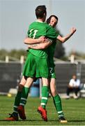 19 March 2019; Team Ireland's Brian O'Sullivan, 11, a member of Limerick Celtic, from Rathkeale, Co. Limerick, celebrates with team-mate Team Ireland's Wayne O'Callaghan, a member of the Ballincollig SO Club, from Vicarstown, Co. Cork, after scoring the third goal as Team Ireland beat SO Estonia 7-2 to take the Bronze medal place on Day Five of the 2019 Special Olympics World Games in Zayed Sports City, Airport Road, Abu Dhabi, United Arab Emirates.  Photo by Ray McManus/Sportsfile