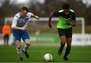 19 March 2019; Eric Abulu of TU Dublin Blanchardstown in action against Dan Ridge of TU Dublin Tallaght during the RUSTLERS Third Level CUFL Men's Division One Final match between Technological University Blanchardstown and Technological University Tallaght at Athlone Town Stadium in Athlone, Co. Westmeath. Photo by Harry Murphy/Sportsfile