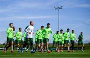 20 March 2019; Republic of Ireland fitness coach Andy Liddle leads the players during warm-up prior to a Republic of Ireland training session at the FAI National Training Centre in Abbotstown, Dublin. Photo by Stephen McCarthy/Sportsfile