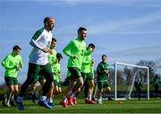 20 March 2019; Republic of Ireland fitness coach Andy Liddle and Jack Byrne leads the players during warm-up prior to a Republic of Ireland training session at the FAI National Training Centre in Abbotstown, Dublin. Photo by Stephen McCarthy/Sportsfile