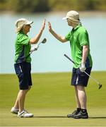20 March 2019; Team Ireland's Andrew Simington, a member of Blackrock Flyers Special Olympics Club, from Dalkey, Co. Dublin, and his Alternate Shot Team Play Partner Phyl Kelleher on the 18th after finishing his Level 2 - Unified Alternate Shot Team Play Competition on Day Six of the 2019 Special Olympics World Games in Yas Links, Yas Island, Abu Dhabi, United Arab Emirates  Photo by Ray McManus/Sportsfile