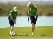 20 March 2019; Team Ireland's Mairead Moroney, left, a member of the Ennis SOGC, from Ennis, Co. Clare, who has the distinction of being the oldest athlete at the Games, and her Alternate Shot Tean Play Partner Jean Molony on the 18th after finishing her Level 2 - Unified Alternate Shot Team Play Competition on Day Six of the 2019 Special Olympics World Games in Yas Links, Yas Island, Abu Dhabi, United Arab Emirates  Photo by Ray McManus/Sportsfile