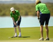 20 March 2019; Team Ireland's Mairead Moroney, left, a member of the Ennis SOGC, from Ennis, Co. Clare, who has the distinction of being the oldest athlete at the Games, and her Alternate Shot Team Play Partner Jean Molony on the 18th after finishing her Level 2 - Unified Alternate Shot Team Play Competition on Day Six of the 2019 Special Olympics World Games in Yas Links, Yas Island, Abu Dhabi, United Arab Emirates  Photo by Ray McManus/Sportsfile