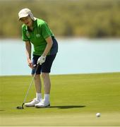 20 March 2019; Team Ireland's Mairead Moroney, left, a member of the Ennis SOGC, from Ennis, Co. Clare, who has the distinction of being the oldest athlete at the Games, watches her putt on the 18th after finishing her Level 2 - Unified Alternate Shot Team Play Competition on Day Six of the 2019 Special Olympics World Games in Yas Links, Yas Island, Abu Dhabi, United Arab Emirates  Photo by Ray McManus/Sportsfile
