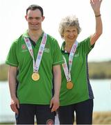 20 March 2019; Team Ireland's Andrew Simington, a member of Blackrock Flyers Special Olympics Club, from Dalkey, Co. Dublin, and his Alternate Shot Team Play Partner Phyl Kelleher as they collect the Gold Medal in the  Level 2 - Unified Alternate Shot Team Play Competition on Day Six of the 2019 Special Olympics World Games in Yas Links, Yas Island, Abu Dhabi, United Arab Emirates. Photo by Ray McManus/Sportsfile