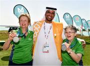 20 March 2019; Special Olympics Volunteer Mansoor Ali Aljaberi with Team Ireland's Mairead Moroney, a member of the Ennis SOGC, from Ennis, Co. Clare, who has the distinction of being the oldest athlete at the Games, and her Alternate Shot Team Play Partner Jean Molony, left, after they had collected their Silver Medal in the Level 2 - Unified Alternate Shot Team Play Competition on Day Six of the 2019 Special Olympics World Games in Yas Links, Yas Island, Abu Dhabi, United Arab Emirates  Photo by Ray McManus/Sportsfile