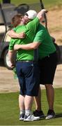 20 March 2019; Team Ireland's Mark Claffey, a member of the Blackrock Flyers Special Olympics Club, from Blackrock, Co. Dublin, hugs his brother Aidan after winning a Gold Medal in the Level 4 - Individual Stroke Play Competition on Day Six of the 2019 Special Olympics World Games in Yas Links, Yas Island, Abu Dhabi, United Arab Emirates  Photo by Ray McManus/Sportsfile