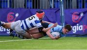 20 March 2019; David Fegan of St Michael's College scores the winning try late in the game, despite the efforts of Tom Brigg of Blackrock College, during the Bank of Ireland Leinster Schools Junior Cup Final match between Blackrock College and St Michael’s College at Energia Park in Donnybrook, Dublin. Photo by Piaras Ó Mídheach/Sportsfile