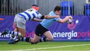 20 March 2019; David Fegan of St Michael's College scores the winning try late in the game, despite the efforts of Tom Brigg of Blackrock College, during the Bank of Ireland Leinster Schools Junior Cup Final match between Blackrock College and St Michael’s College at Energia Park in Donnybrook, Dublin. Photo by Piaras Ó Mídheach/Sportsfile