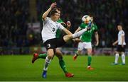 21 March 2019; Artur Pikk of Estonia in action against Niall McGinn of Northern Ireland during the UEFA EURO2020 Qualifier - Group C match between Northern Ireland and Estonia at National Football Stadium in Windsor Park, Belfast.  Photo by David Fitzgerald/Sportsfile