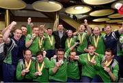 22 March 2019; The Team Ireland soccer team who won bronze medals with former Republic of Ireland International Niall Quinn on their return from the 2019 World Summer Games Abu Dhabi at Dublin Airport in Dublin. Photo by Matt Browne/Sportsfile
