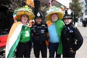 23 March 2019; Republic of Ireland supporters Frankie Murrin, from Killybegs, left, and Bobby Cunningham, from Kilcar, with members of the local police force prior to the UEFA EURO2020 Qualifier Group D match between Gibraltar and Republic of Ireland at Victoria Stadium in Gibraltar. Photo by Stephen McCarthy/Sportsfile