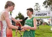 23 March 2019; Jack McCausland of Belfast Royal Academemical Institute, Co.Antrim, Ireland, right, is congratulated by James Peck of Milldenhall Colledge Academy, Suffolk ,England, after competing in the Junior Boys event  during the SIAB Schools Cross Country International at Santry Demense in Santry, Dublin. Photo by Sam Barnes/Sportsfile