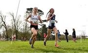 23 March 2019; Beatrice Wood of South Wiltshire Grammar School For Girls, Wiltshire, England, left, and Anna Hedley of Madras College, St Andrew's ,Scotland, competing in the Inter Girls event during the SIAB Schools Cross Country International at Santry Demense in Santry, Dublin. Photo by Sam Barnes/Sportsfile