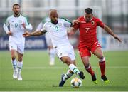 23 March 2019; David McGoldrick of Republic of Ireland in action against Lee Casciaro of Gibraltar during the UEFA EURO2020 Qualifier Group D match between Gibraltar and Republic of Ireland at Victoria Stadium in Gibraltar. Photo by Stephen McCarthy/Sportsfile