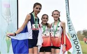 23 March 2019; Junior girls indiviudal medallists, from left, Katie Johnson of Preston Lodge High School, Prestonpans, Scotland, bronze, Holly  Weedall of Weaverham High School, Cheshire, England, gold and Kiya Dee of Farmors School, Gloucestershire ,England, silver, during the SIAB Schools Cross Country International at Santry Demense in Santry, Dublin. Photo by Sam Barnes/Sportsfile