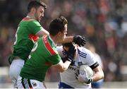 24 March 2019; Conor McManus of Monaghan in action against Brendan Harrison, left, and Stephen Coen of Mayo during the Allianz Football League Division 1 Round 7 match between Mayo and Monaghan at Elverys MacHale Park in Castlebar, Mayo. Photo by Piaras Ó Mídheach/Sportsfile