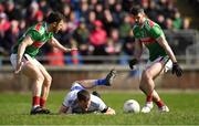 24 March 2019; Conor McManus of Monaghan after being tackled by Brendan Harrison of Mayo, right, as Chris Barrett looks on during the Allianz Football League Division 1 Round 7 match between Mayo and Monaghan at Elverys MacHale Park in Castlebar, Mayo. Photo by Piaras Ó Mídheach/Sportsfile