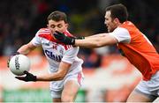 24 March 2019; Mark Collins of Cork in action against Brendan Donaghy of Armagh during the Allianz Football League Division 2 Round 7 match between Armagh and Cork at the Athletic Grounds in Armagh. Photo by Ramsey Cardy/Sportsfile