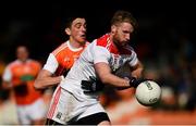 24 March 2019; Ruairi Deane of Cork in action against Rory Grugan of Armagh during the Allianz Football League Division 2 Round 7 match between Armagh and Cork at the Athletic Grounds in Armagh. Photo by Ramsey Cardy/Sportsfile