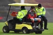 24 March 2019; Mayo goalkeeper David Clarke leaves the field on a medical buggy, after a first half challenge from Darren Hughes of Monaghan, who was shown a yellow card by referee Derek O'Mahoney, during the Allianz Football League Division 1 Round 7 match between Mayo and Monaghan at Elverys MacHale Park in Castlebar, Mayo. Photo by Piaras Ó Mídheach/Sportsfile