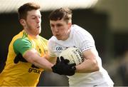 24 March 2019; Neil Flynn of Kildare, left, in action against Eoghan Ban Gallagher of Donegal  during the Allianz Football League Division 2 Round 7 match between Donegal and Kildare at Fr. Tierney Park in Ballyshannon, Donegal. Photo by Oliver McVeigh/Sportsfile