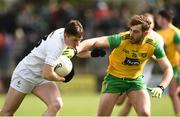 24 March 2019; Neil Flynn of Kildare in action against Stephen McMenamin of Donegal  during the Allianz Football League Division 2 Round 7 match between Donegal and Kildare at Fr. Tierney Park in Ballyshannon, Donegal. Photo by Oliver McVeigh/Sportsfile