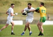 24 March 2019; Fergal Conway of Kildare in action against Jamie Brennan of Donegal during the Allianz Football League Division 2 Round 7 match between Donegal and Kildare at Fr. Tierney Park in Ballyshannon, Donegal. Photo by Oliver McVeigh/Sportsfile