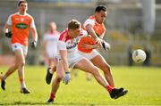 24 March 2019; Sean White of Cork in action against Jemar Hall of Armagh during the Allianz Football League Division 2 Round 7 match between Armagh and Cork at the Athletic Grounds in Armagh. Photo by Ramsey Cardy/Sportsfile