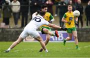 24 March 2019; Ryan McHugh of Donegal scoring a point despite the tackle of Fergal Conway of Kildare during the Allianz Football League Division 2 Round 7 match between Donegal and Kildare at Fr. Tierney Park in Ballyshannon, Donegal. Photo by Oliver McVeigh/Sportsfile