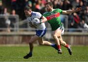24 March 2019; Conor McManus of Monaghan in action against Chris Barrett of Mayo during the Allianz Football League Division 1 Round 7 match between Mayo and Monaghan at Elverys MacHale Park in Castlebar, Mayo. Photo by Piaras Ó Mídheach/Sportsfile