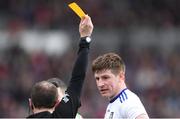 24 March 2019; Darren Hughes of Monaghan is shown the yellow card by referee Derek O'Mahoney for a challenge on Mayo goalkeeper David Clarke during the Allianz Football League Division 1 Round 7 match between Mayo and Monaghan at Elverys MacHale Park in Castlebar, Mayo. Photo by Piaras Ó Mídheach/Sportsfile